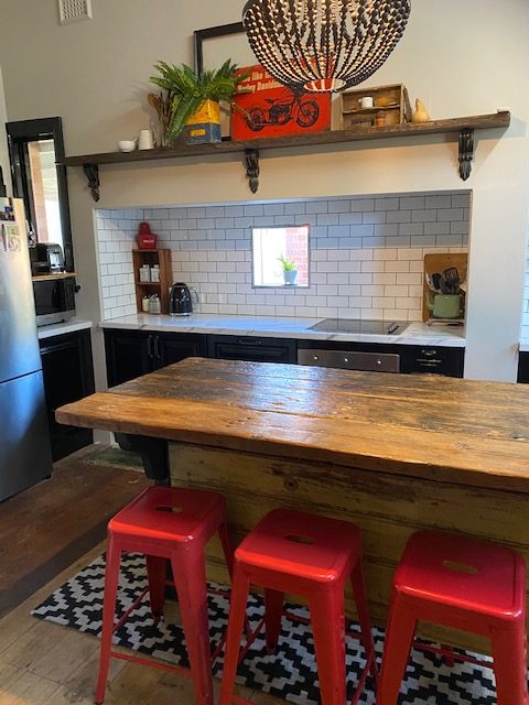 Rustic kitchen with timber island bench