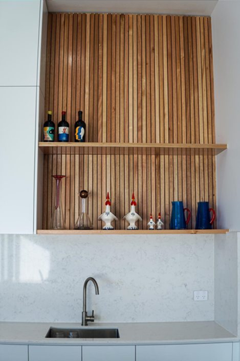 Timber feature shelf detail with slatted backing